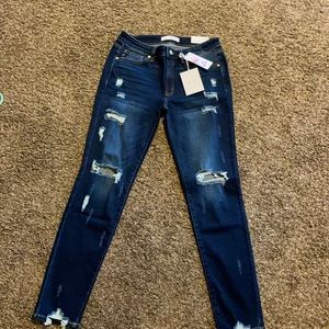 Size 9/28 dark blue distressed jeans